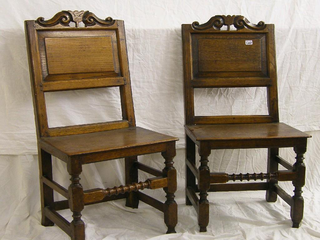 Appraisal: Pair of th th century oak Lancashire hall chairs the