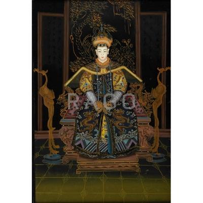 Appraisal: PAIR OF CHINESE REVERSE PAINTED GLASS PANELS Depicting an Emperor