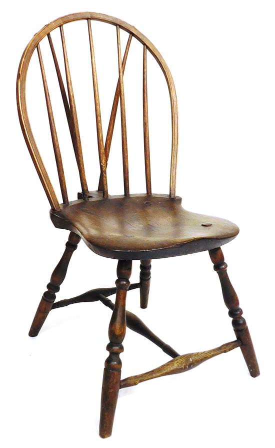 Appraisal: Windsor brace back side chair unusual form that furniture scholar