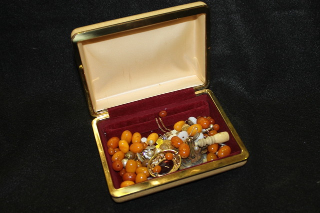 Appraisal: A COLLECTION OF MISCELLANEOUS including amber beads an amber cigar