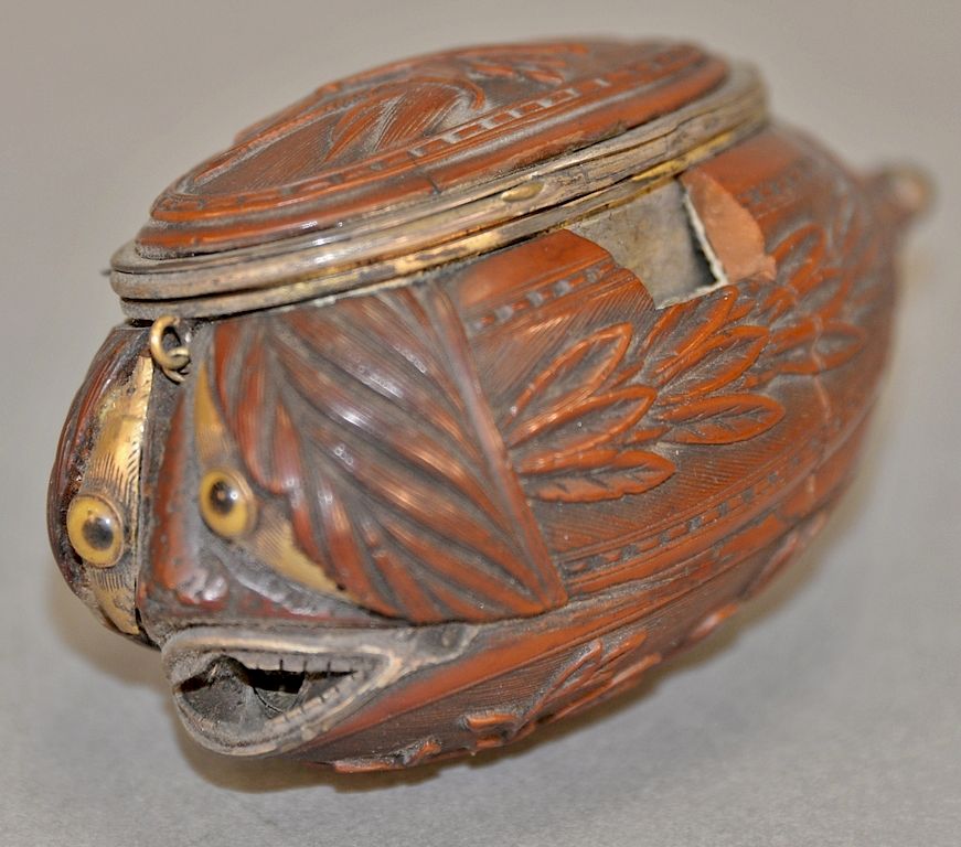 Appraisal: Antique French carved coquilla nut snuff box with carved top