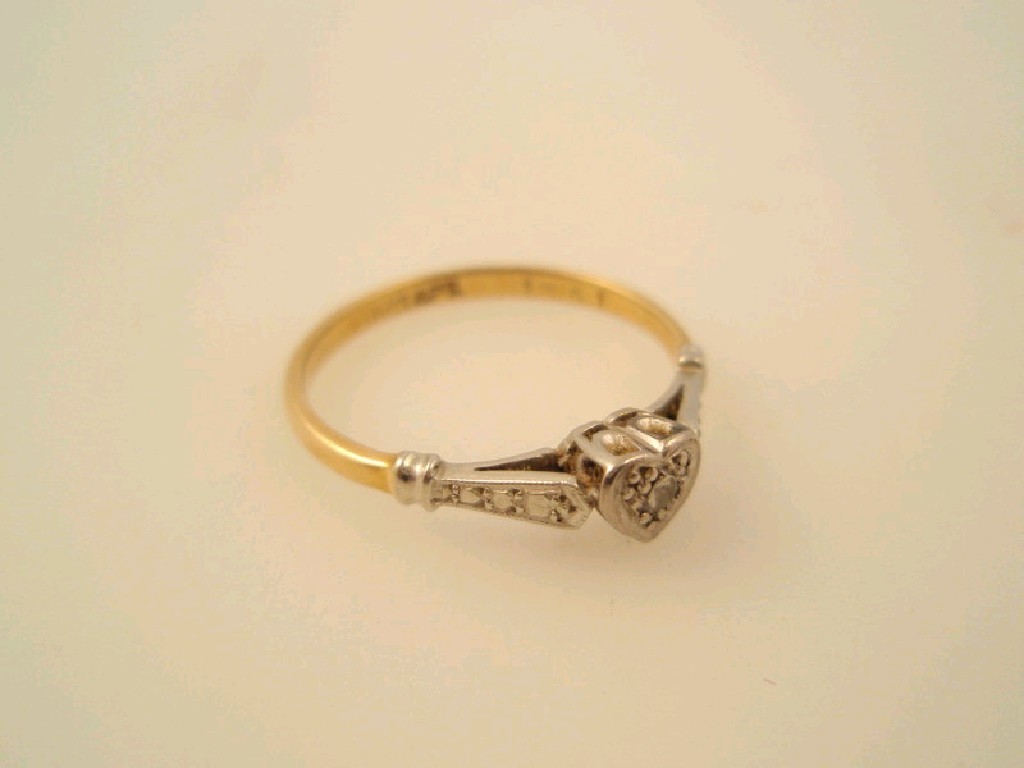 Appraisal: A small heart shaped tiny diamond set ring yellow metal