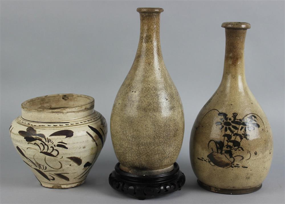 Appraisal: TWO JAPANESE SETO WARE SAKE BOTTLES TH CENTURY the first