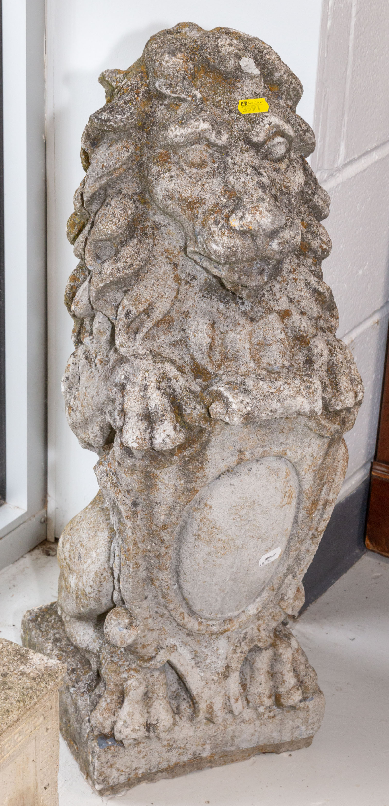 Appraisal: LION-FORM CONCRETE GARDEN FIGURE st half th century in H