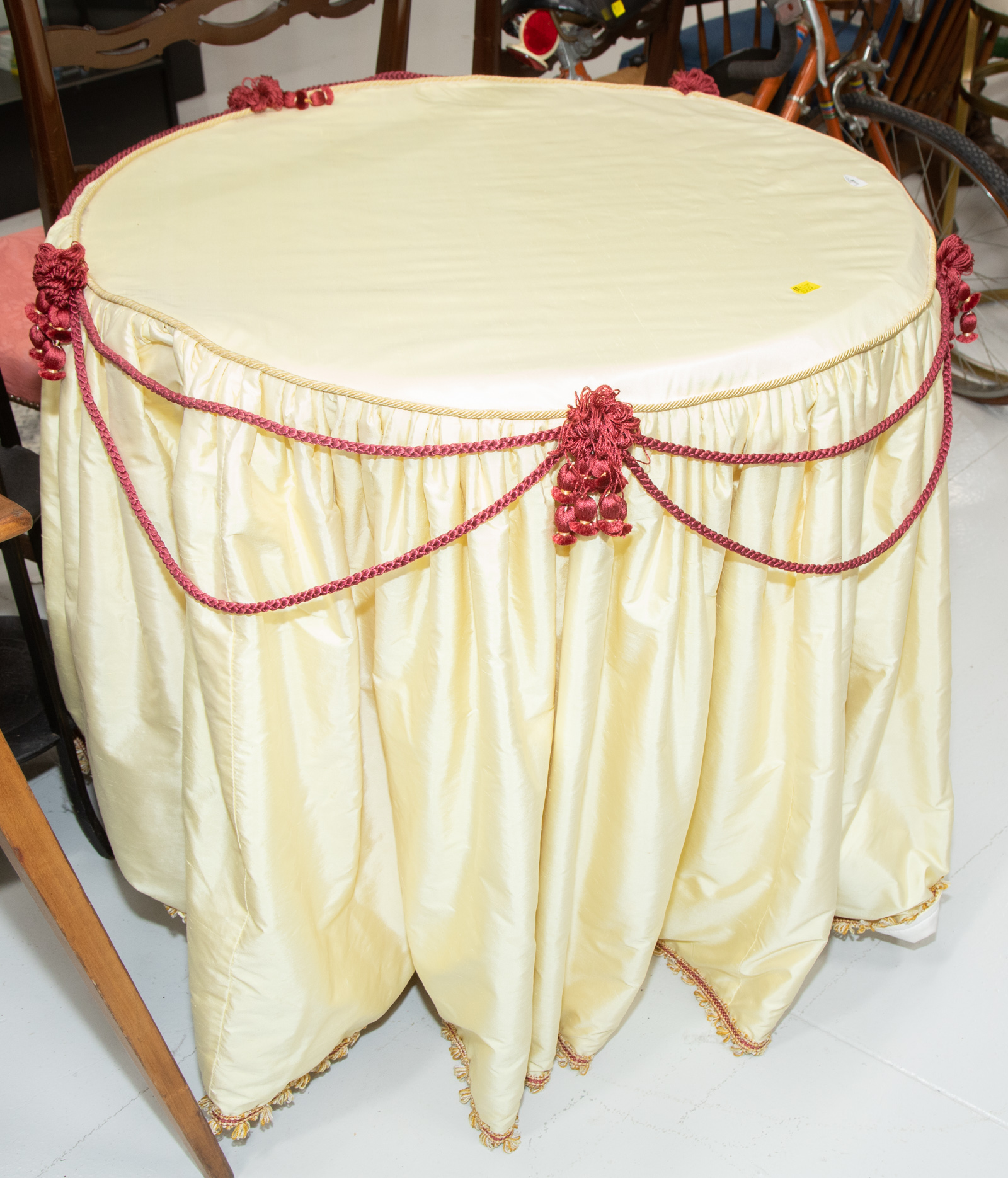 Appraisal: VICTORIAN STYLE DRAPED BOUDOIR TABLE Contemporary yellow silk with padding