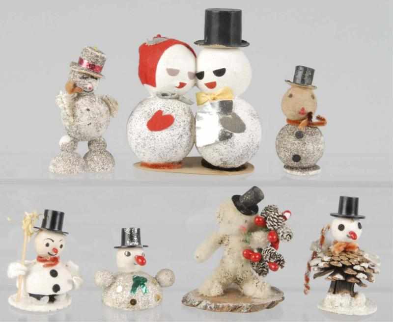 Appraisal: Lot of Christmas Snowmen Description Made of paper mache and