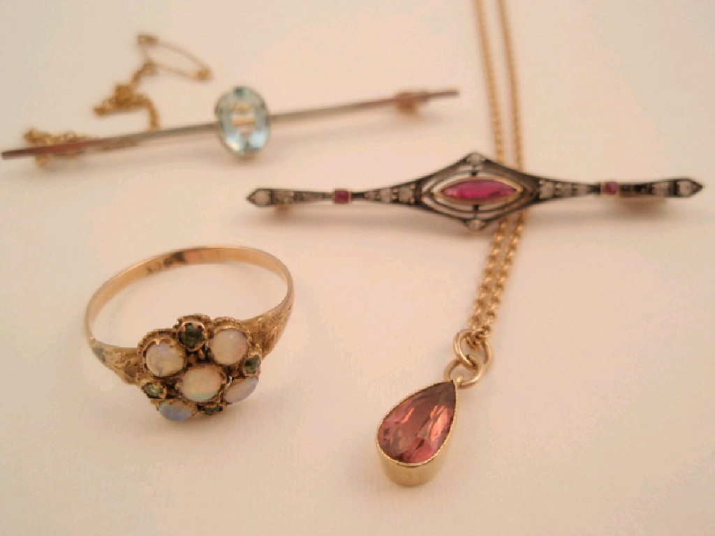 Appraisal: Two gem set Victorian bar brooches a gem set pendant