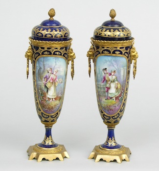 Appraisal: A Pair of Sevres Lidded Urns A lovely pair of