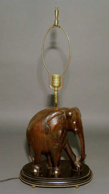 Appraisal: Carved ebony elephant lamp h x w x d