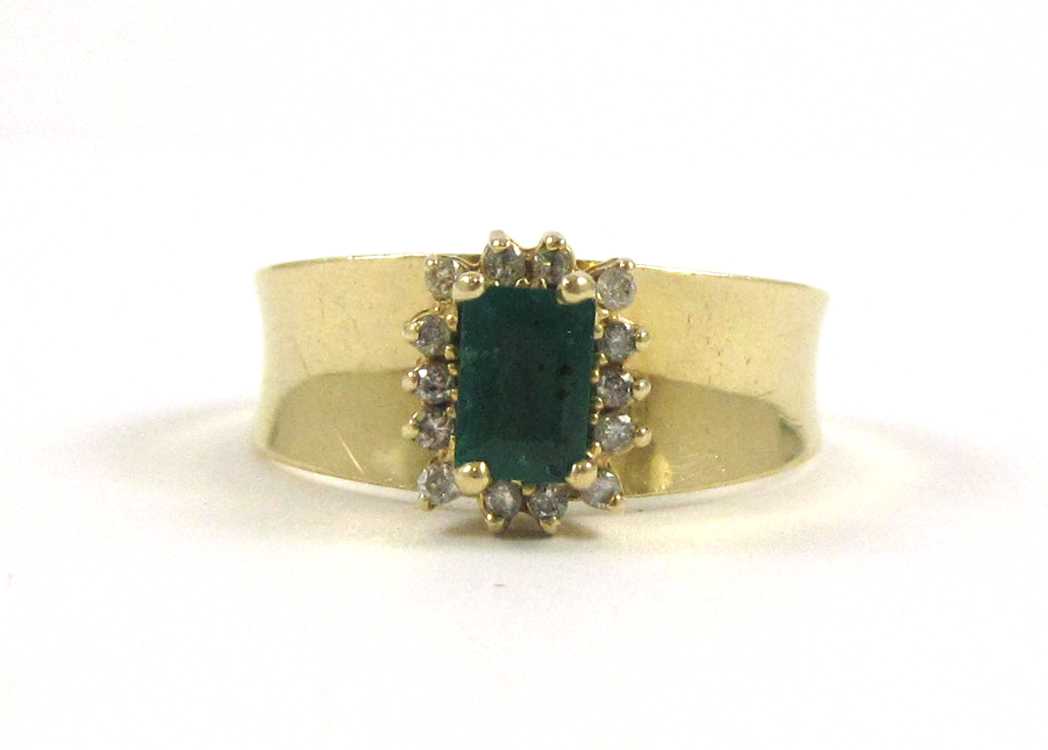 Appraisal: EMERALD DIAMOND AND FOURTEEN KARAT GOLD RING with round-cut diamonds