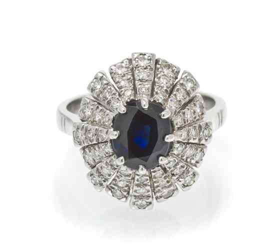 Appraisal: A Karat White Gold Sapphire and Diamond Ring containing one