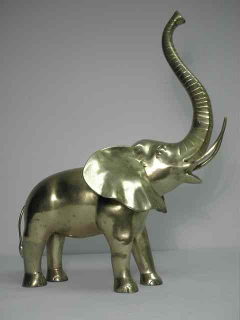 Appraisal: Polished brass sculpture of an elephant Condition good minor scuffs