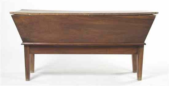 Appraisal: A French Provincial Walnut Doughbox having a rectangular top over