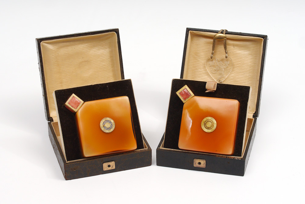 Appraisal: PAIR FRENCH GLASS PERFUME BOTTLES IN ORIGINAL BOXES Marked ''Devinez