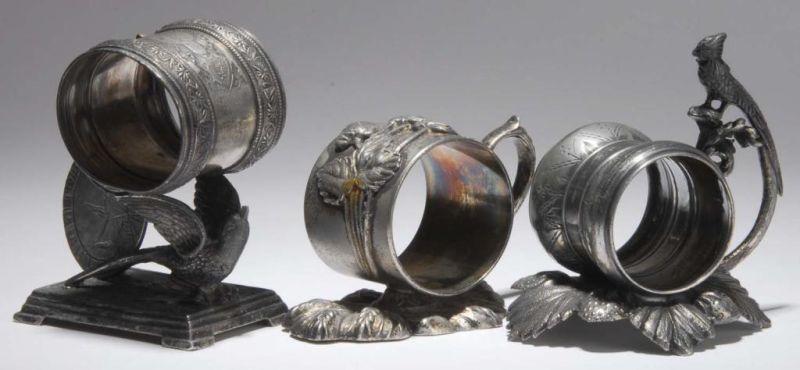 Appraisal: Lot of Figural Napkin Rings Description First has a long