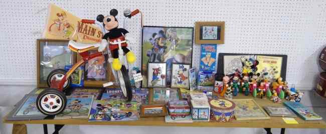 Appraisal: Mickey Mouse bicycle related items including Mickey Trike framed pictures