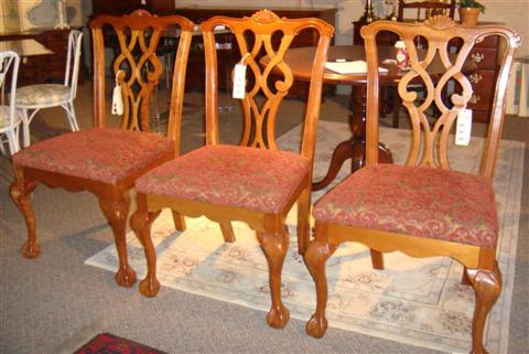 Appraisal: THREE CHIPPENDALE STLYE SIDE CHAIRS WITH RED AND GOLD BROCADE