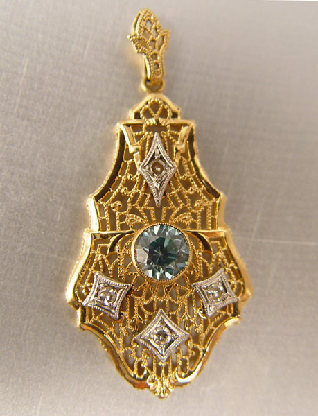 Appraisal: K FILIGREE ZIRCON DIAMOND PENDANT K yellow with white gold