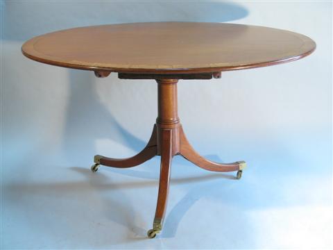 Appraisal: GEORGE III STYLE MAHOGANY BREAKFAST TABLE The nicely figured banded