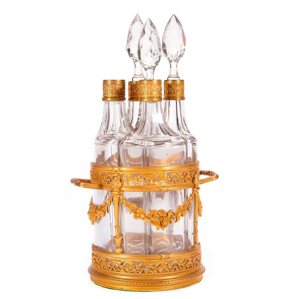 Appraisal: Decanter set A Continental gilt-bronze and crystal decanter set H