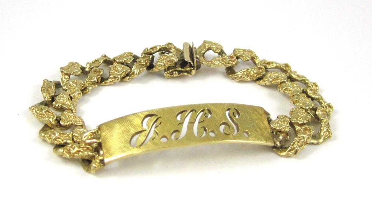 Appraisal: FOURTEEN KARAT GOLD ID BRACELET The ID tag having the