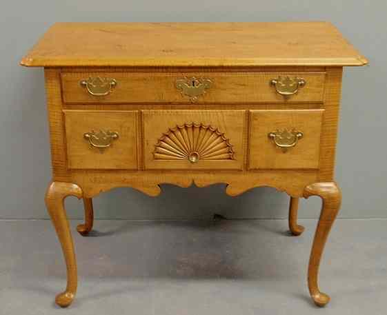 Appraisal: New England Queen Anne style tiger maple lowboy with a