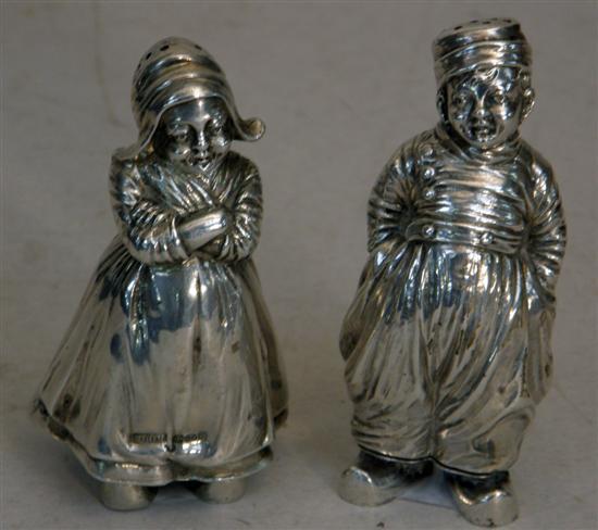 Appraisal: Matched pair of Continental silver figural salt and pepper pots