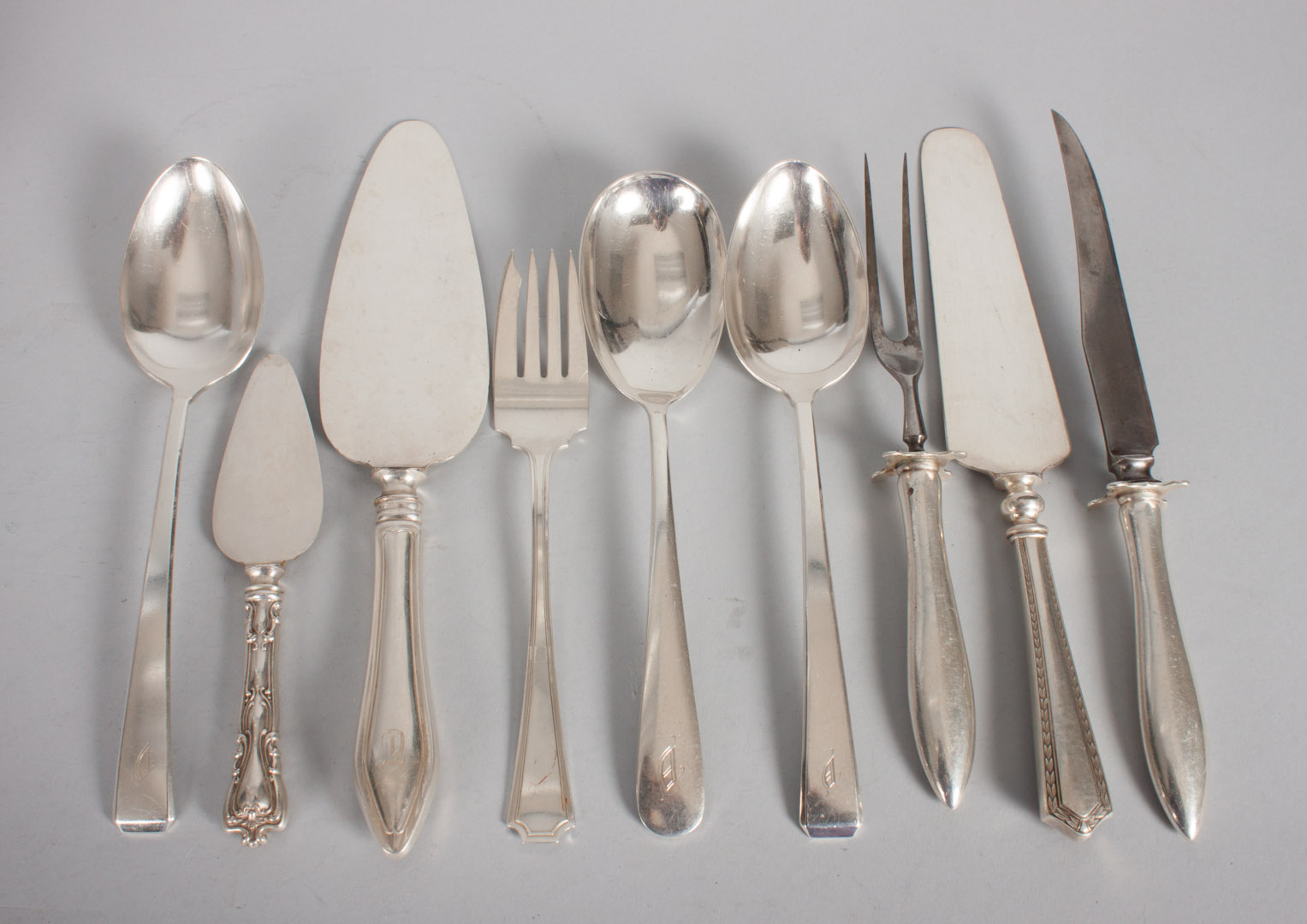 Appraisal: Nine sterling sterling handle serving pieces includ a pair of