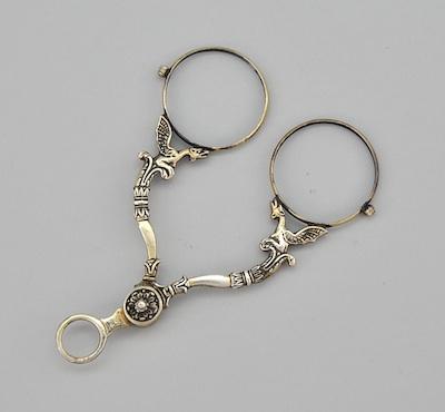 Appraisal: A Silver Lorgnette Hallmarked European silver lorgnette with dragon motif