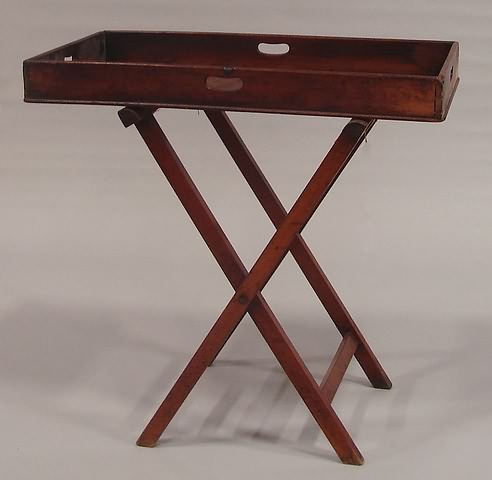 Appraisal: Mahogany with dovetailed gallery and pierced cutout handles resting on