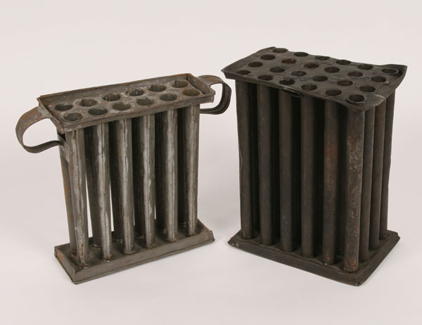 Appraisal: A pair of antique primitive tin candle molds twelve-tube with