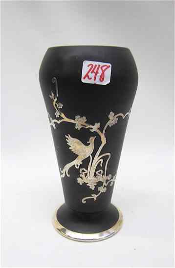 Appraisal: A TIFFIN BLACK SATIN PEDESTAL VASE with sterling silver overlay