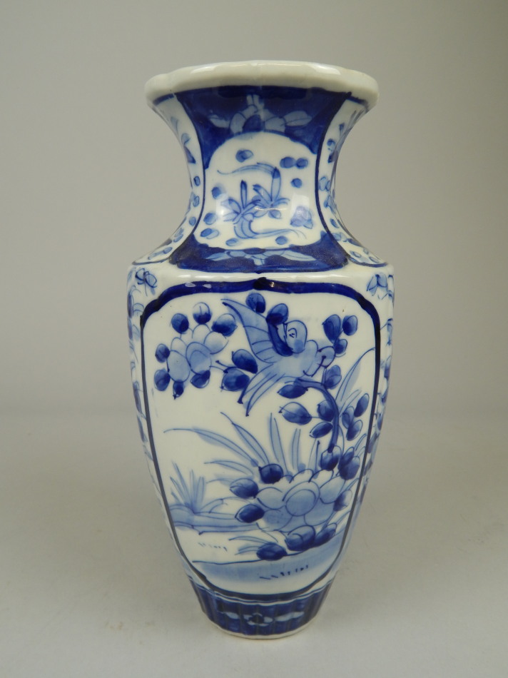 Appraisal: A Japanese porcelain vase decorated in blue with flowers etc