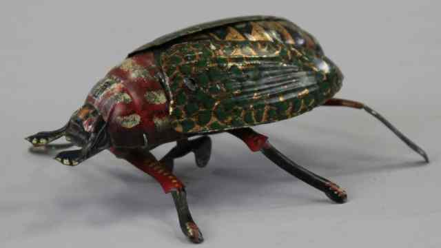 Appraisal: LEHMANN BEETLE Lithographed tin incredible flapping wing action when clockwork