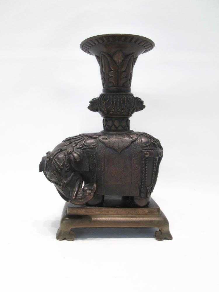 Appraisal: CHINESE BRONZE ELEPHANT VASE depicting an elephant adorned in ceremonial