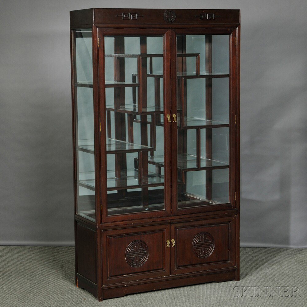 Appraisal: Glazed Display Cabinet China hardwood cabinet with doors beneath decorated