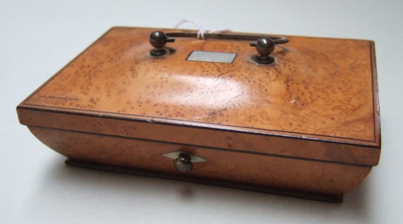 Appraisal: A ladies treen hinge lidded jewellery box fitted with a