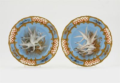 Appraisal: A pair of Royal Worcester cabinet plates painted by Charles