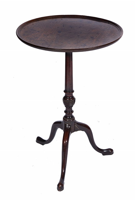 Appraisal: AN ANTIQUE CIRCULAR MAHOGANY WINE TABLE with dished top and