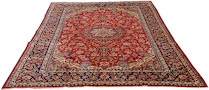 Appraisal: An Isphahan Carpet Bright red panel is woven with a