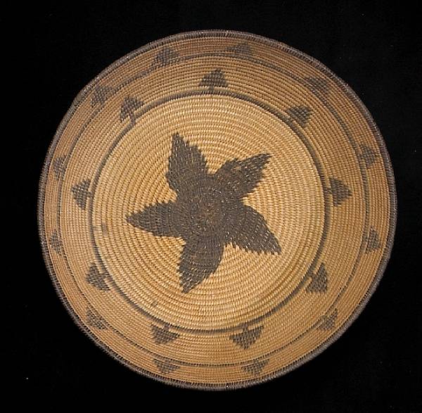 Appraisal: An Apache tray A five-pointed solid star on the base