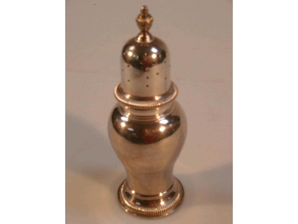 Appraisal: A silver sugar castor of plain baluster form cm high