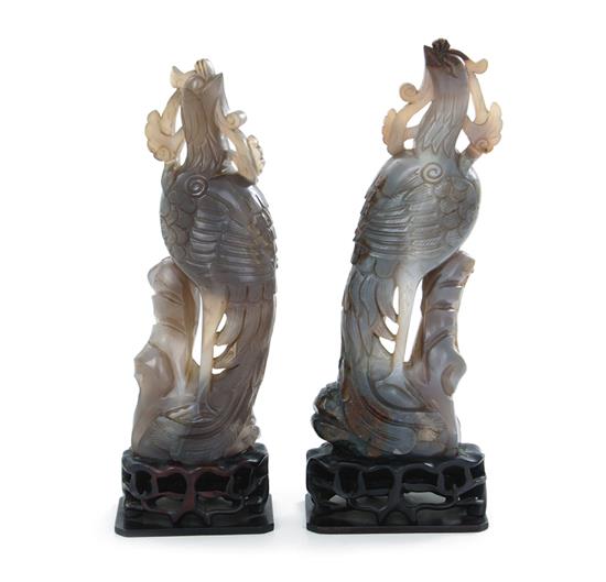 Appraisal: Pair Chinese carved agate Phoenix birds Qing or Republic period