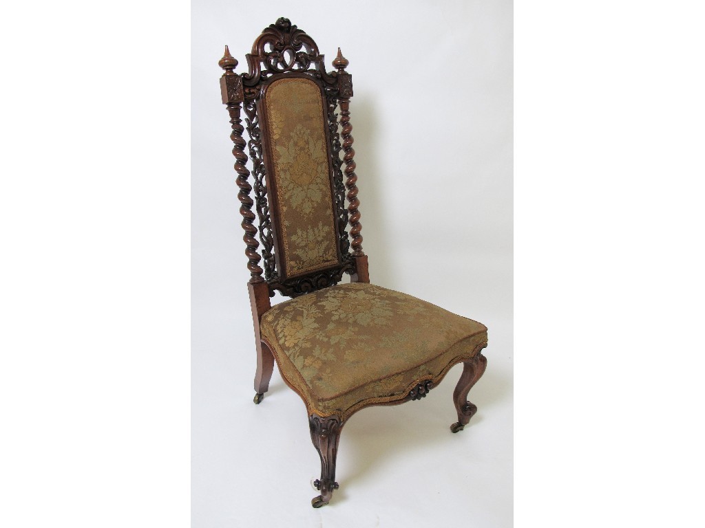 Appraisal: A Victorian rosewood hall chair the shaped top with carved