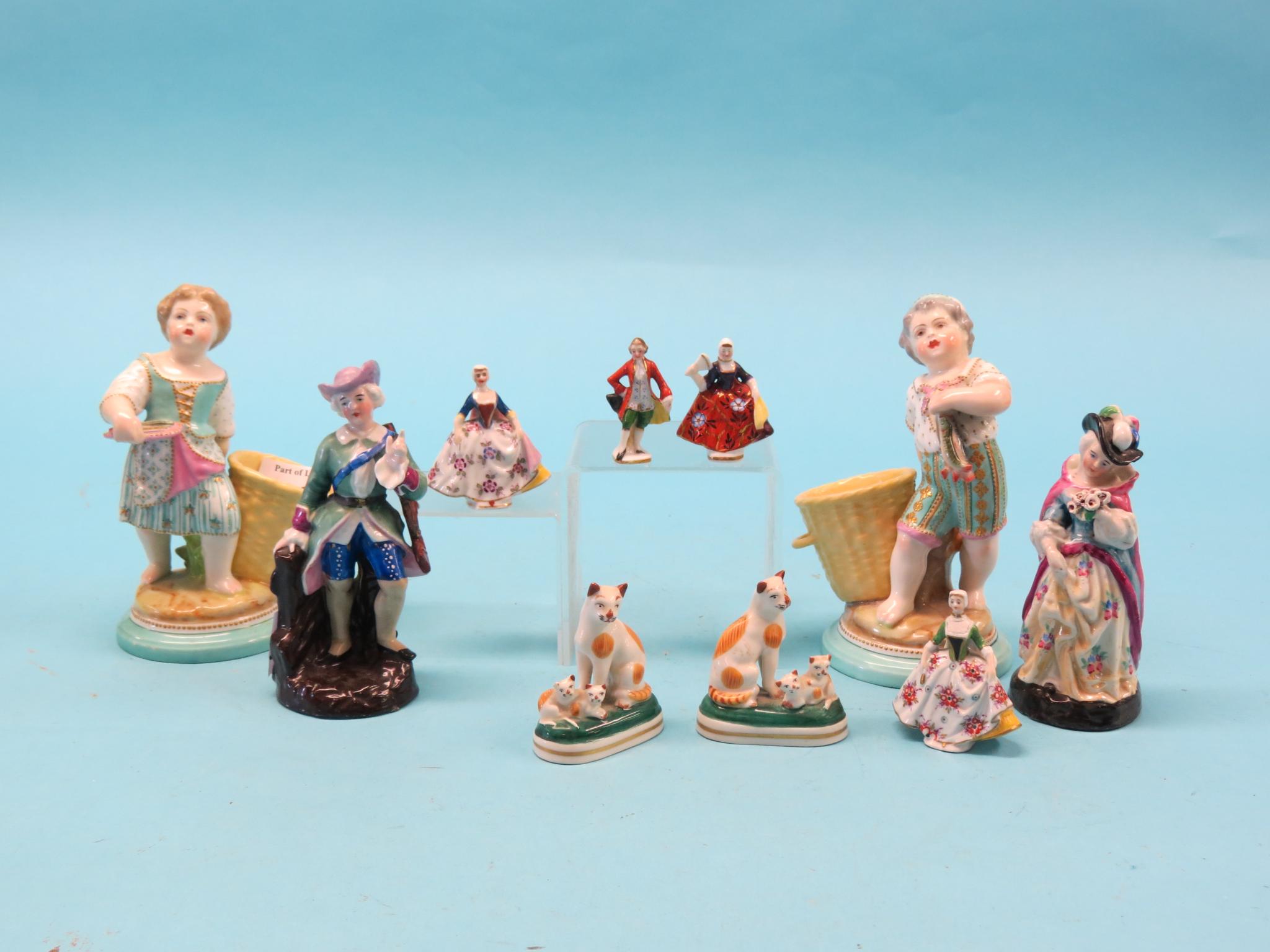 Appraisal: A pair of German porcelain figures boy and girl fishers