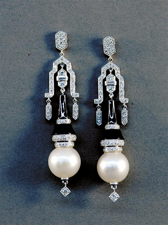 Appraisal: South Sea pearl diamond and onyx drop earrings South Sea