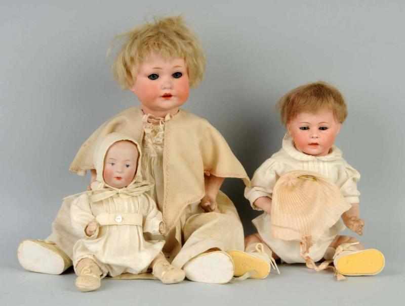 Appraisal: Lot of German Bisque Character Baby Dolls Description One incised