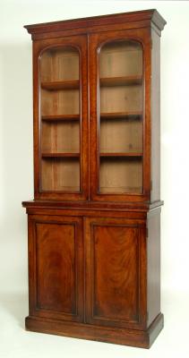 Appraisal: A VICTORIAN MAHOGANY TWO STAGE BOOKCASE the moulded cornice over