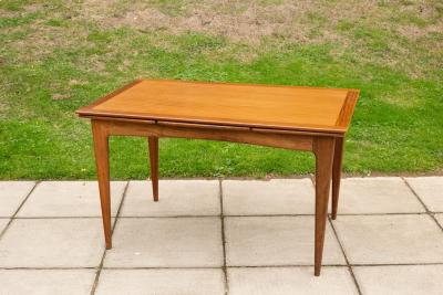 Appraisal: A Younger extending teak dining table s cm x cm