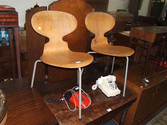 Appraisal: Two Arne Jacobsen 's ant chairs